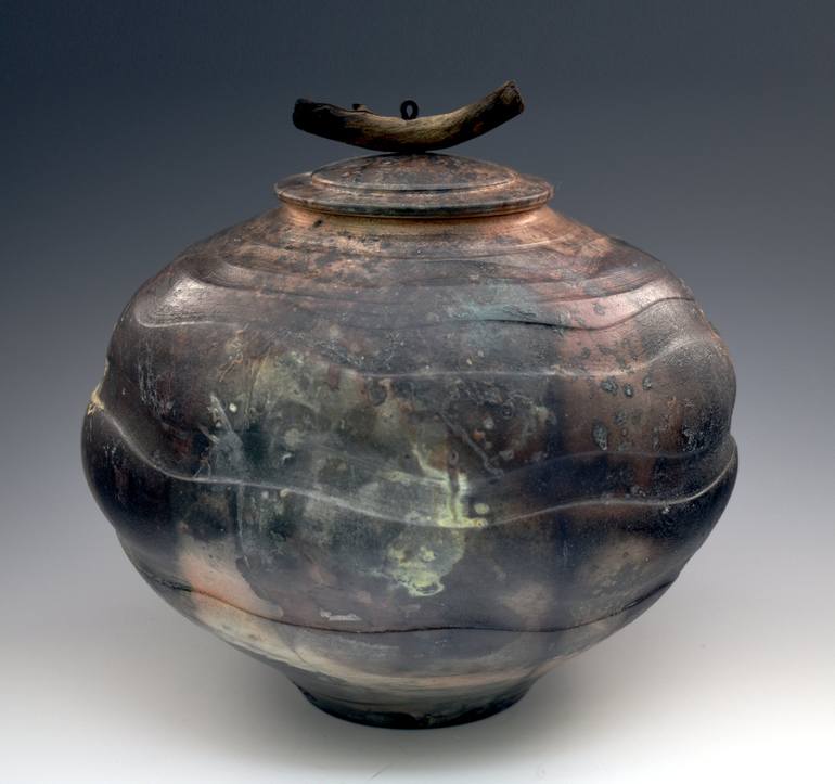 B200 Handmade burnished sagger fired covered urn