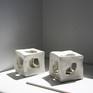 The cube series is an exploration of movement, shape and sculpture in 3D form. The cube has an organic cut out on every side letting in air and light, acting not like a container but a vessel for movement.