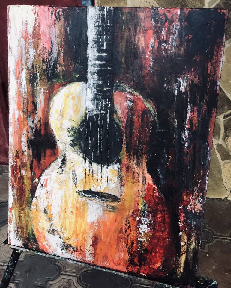 painting guitar with acrylic paint