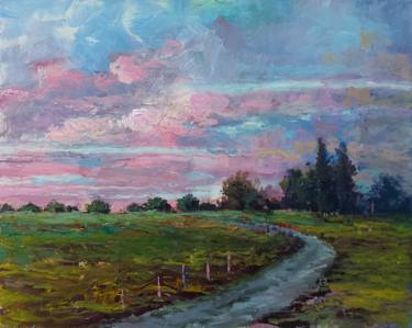 Rustic road at sunset with pink clouds thumb