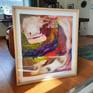 Framed under plexiglass