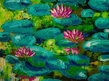 Pink Water lilies in the pond thumb