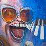 I've been a fan of Elton John since the 1980s and his music has been a big part of my life through the years.  I've tried to capture the outrageousness and energy of Elton's live performance by including glitter and vibrant colors in this painting.  A definite one-of-a kind conversation piece.

Painting comes on stretched canvas with sides painted black, ready to hang.

Painting also comes with a certificate of authenticity signed by the artist.
