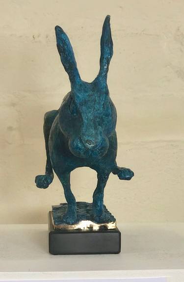Running hare in vivid blue thumb