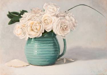 White roses in green pitcher thumb