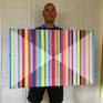 Barcode Geo 2 with the artist showing the scale of the work