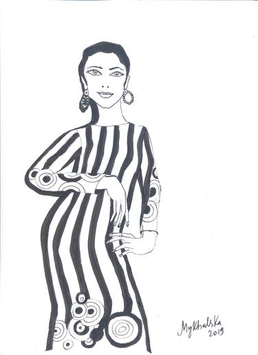 Woman with earrings in stripped dress thumb