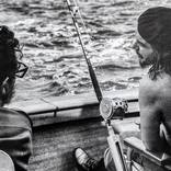 Che Guevara and Fidel Castro on a fishing trip in 1960 .Korda