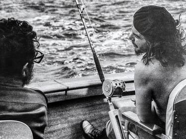 Che Guevara and Fidel Castro on a fishing trip in 1960 .Korda thumb
