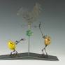 When I started creating this egg pople-Eggtion Figures, I imagined what their life would be. So,I depicted scenic moments of egg people's world. This particular piece " Are You My Papa?" is about adventure of searching their identity or origen.