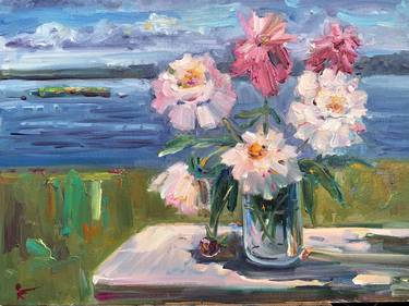 A bouquet of peonies on the river bank thumb