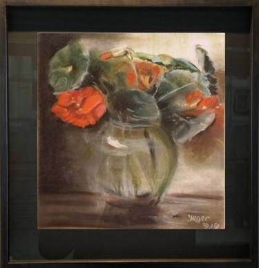 Still life with red flowers in a glass vase thumb