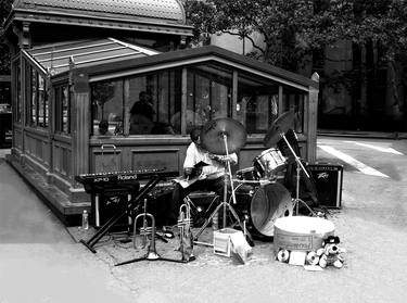 musician in the street thumb