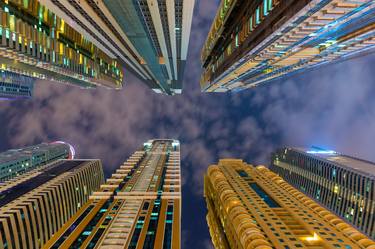 Below view on the luxury modern skyscrapers in Dubai Marina, shot at cloudy night. UAE lifestyle. - Limited Edition of 10 thumb