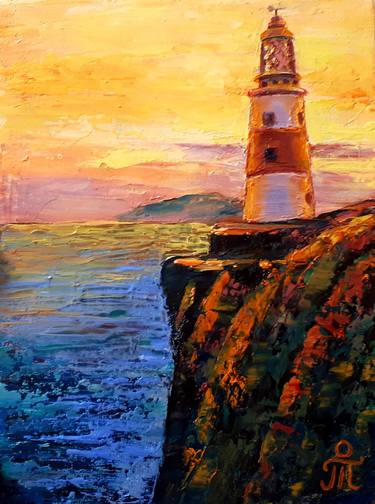 Lighthouse at sunset thumb