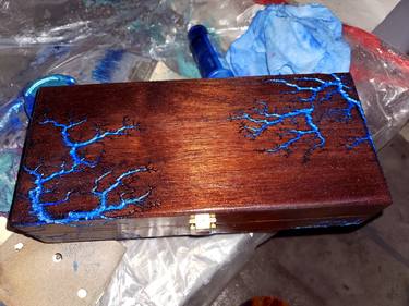 Blue lightning on wood thumb