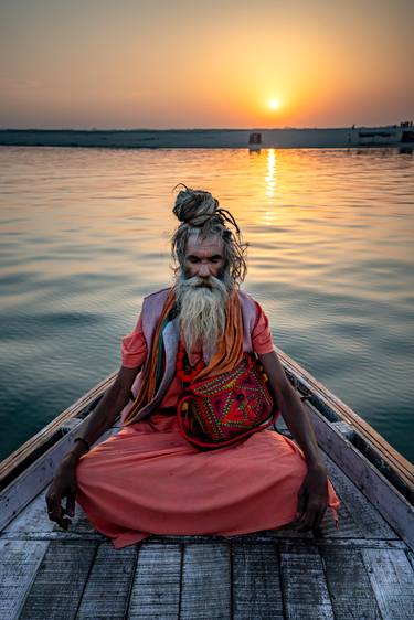 Baba in the Ganges river at sunset thumb