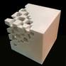 Abstract modern sculpture carved out of pure white marble