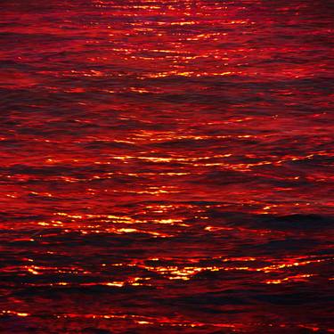 SETTING SUN OVER A RED SEA thumb