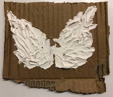 Texture angel wings on cardboard thumb