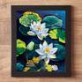 The artwork includes a black frame as a gift.