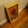 This red rose was an oil painting I created in February as a series exploring roses and flowers through realism. I painted it on reclaimed plywood wood from my local carpentry school. This painting was to explore the curves and beauty within a rose.