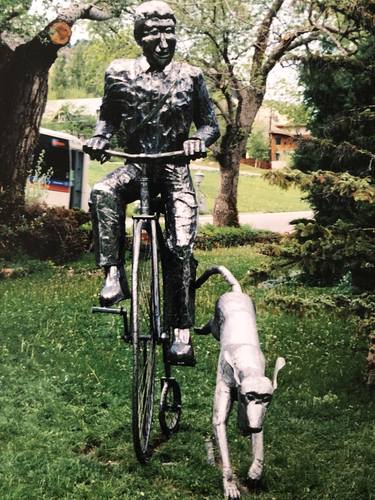 Bicycle man with dog thumb