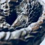 Pangolins themselves inspired the work, using the lost wax method to make a bronze sculpture. Each scale individually applied using a double Phi spiral - which occurs so frequently in nature. These are shy and gentle creatures hunted by man for their highly prized Pangolin scales, rendering all 8 species endangered.
