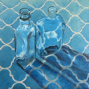 Bottles on blue patterned fabric thumb