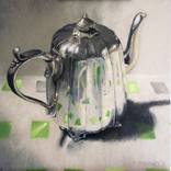 teapot on green square fabric by Paul Brandner