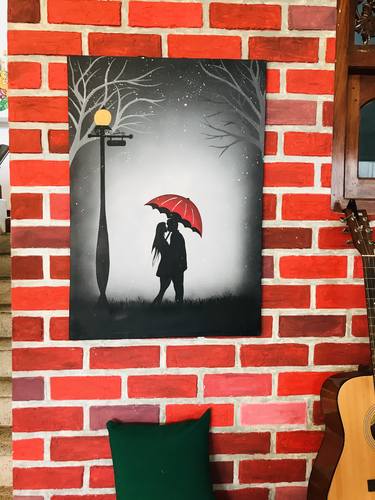 Loving young couple kissing. Romantic framed hand paint wall art .Red umbrella with shadow of couple. thumb