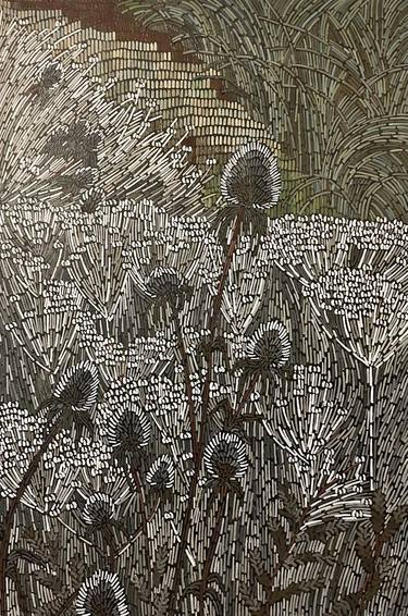 thistles under the snow thumb