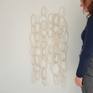 Cecil loves the tide: an ever-changing natural phenomenon. Water, sand, wind, waves
This sculpture consists of nine parts, each part: seven connected white circles. Porcelain. Very light and easy to handle. The pictures show different ways to arrange and hang them. Transparant cord or little nails works perfect.
Available in different sizes.