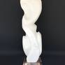 This is white marble sculpture on emperador marble base
The base is 7.5 x7.5 in