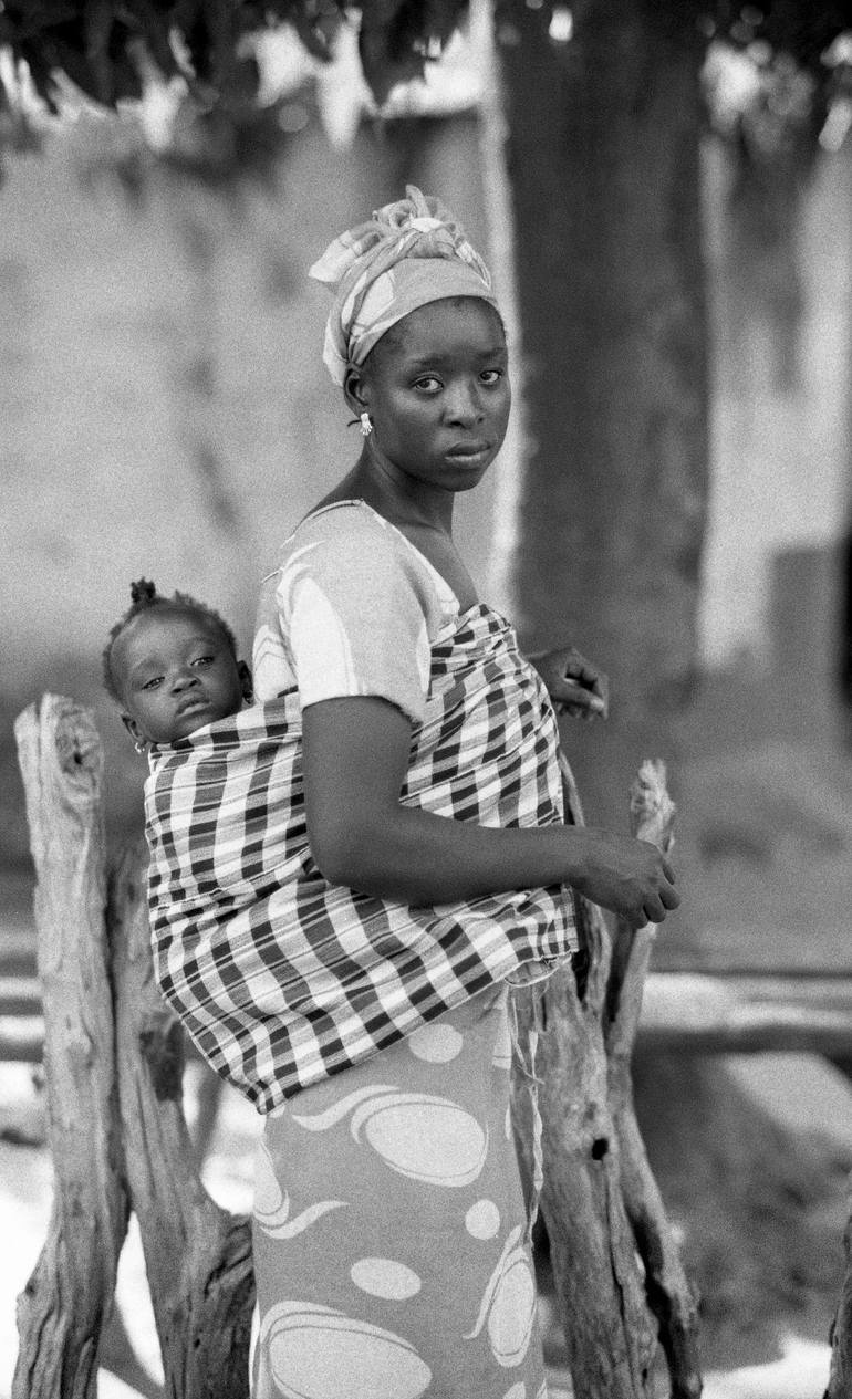 Ndey Seydi with her baby - Kabadio - Senegal Photography by Daniel ...