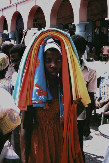 Haiti girl selling fabrics thumb