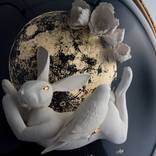 Putting Rabbit to Bed. by Lana Filippone