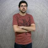 Carlo with a spiral painting by Carlo Keshishian