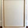 back stapled to wood frame