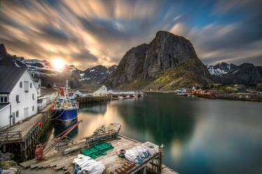 Sunset over Hamnoy Lofoten Islands Norway. Lofoten is an archipelago in Norway. Its known for its dramatic scenery, with peaks like the Svolværgeita p thumb