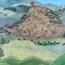 Cows graze under this volcanic formation