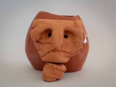 Vase with a thinking face thumb