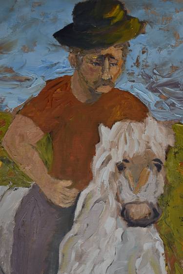 Man and horse in a field. thumb