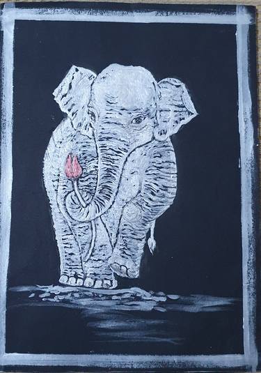 Elephant carrying a lotus thumb