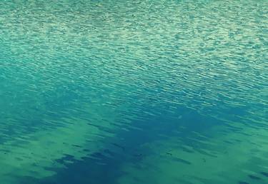 Shimmering turquoise lake water surface thumb