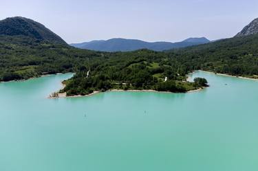 The Lake of Castel San Vincenzo, is an artificial turquoise lake. thumb