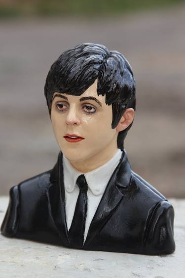 Bust of Paul McCartney in a black jacket thumb