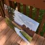 Acrylic on wood. Colorful landscape with water and mountains. I love the pops of orange sunlight in between the distant trees.