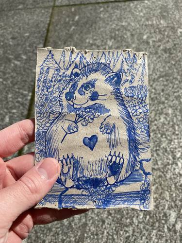 Hedgehog in love sitting on the stairs in the forest thumb
