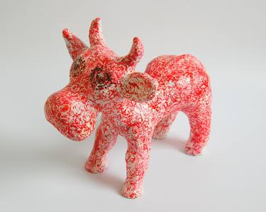 Handmade clay figurine of a bull thumb